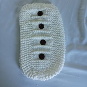 White crocheted newborn cocoon outfit.